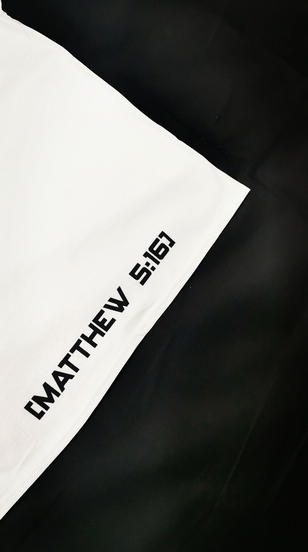 Blacktapechamchristlike white crew tee featuring Matthew 5:16 screen-printed text on 100% combed cotton fabric