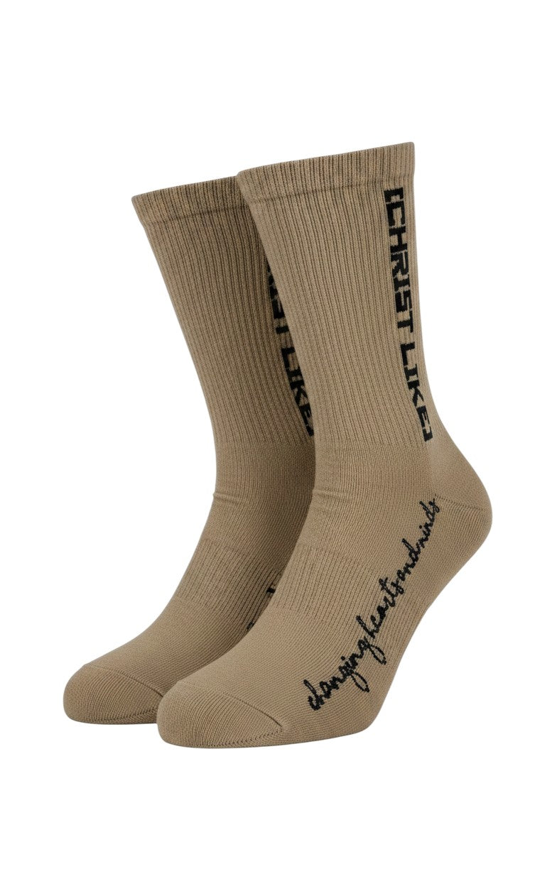 Blacktapechamchristlike Potter's Clay crew socks in tan cotton with black Christ Like embroidery and script text