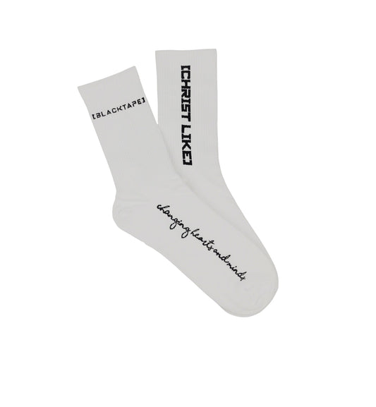 Blacktapechamchristlike white cotton crew socks with black embroidered text and Christ Like branding
